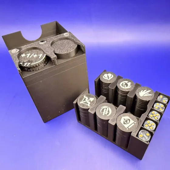 The Commander Cube beside its removable organizer, loaded with status tokens and dice