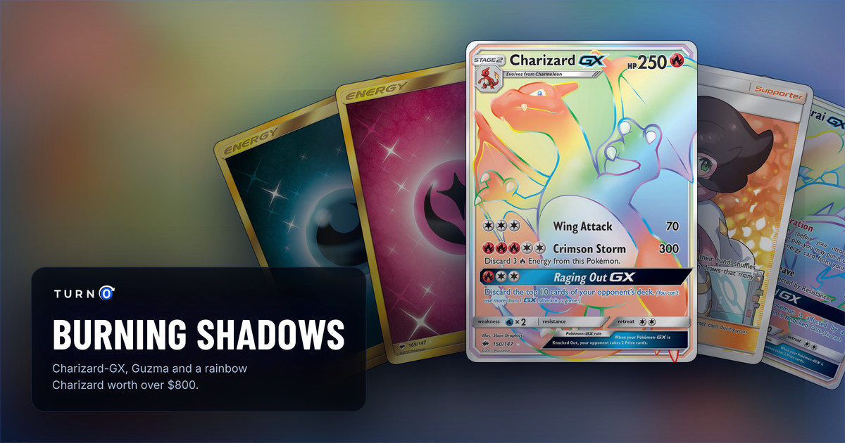 Five Burning Shadows chase cards fanned out: Darkness Energy, Fairy Energy, Charizard-GX in front, Wicke and Darkrai-GX.